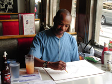 Stephen sketches in a New York diner